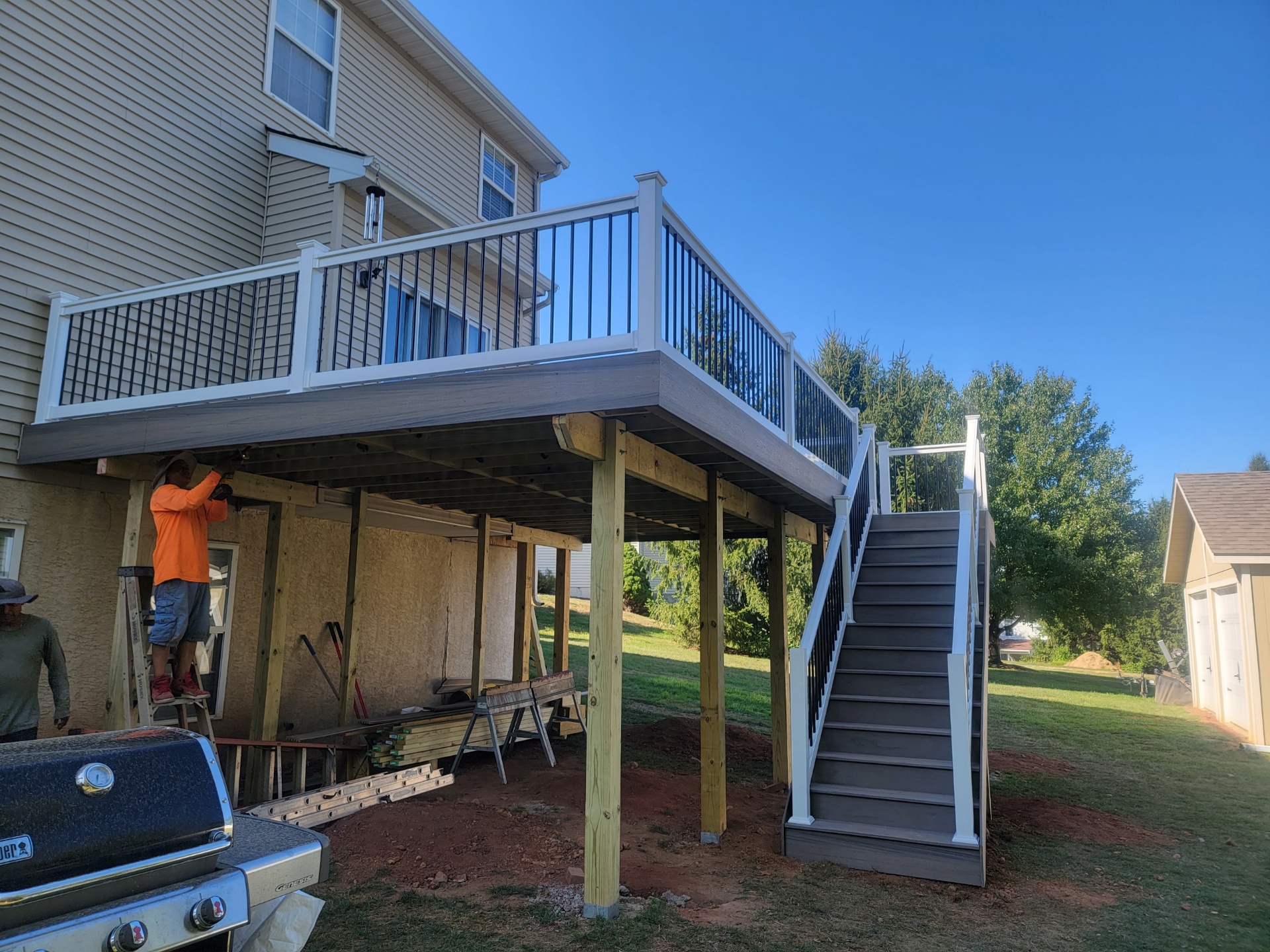 ksw employee working on a new deck remodel