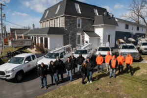 KSW's expert roofing services team standing outside for a group photo.