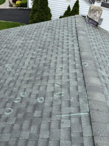 Roof storm damage caused by hail.