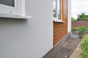 An image of the side of a home with stucco siding.