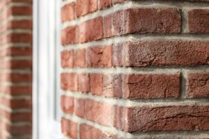 A close-up image of brick siding on a building.