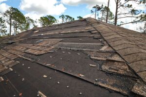 A dirty brown roof, hurt by wind damage