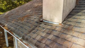 A brown roof is impacted by water damage