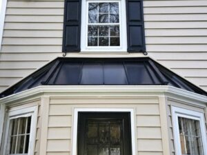 close up view of the cream vinyl siding