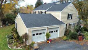 cream vinyl siding being shown on a residential house birds eye view