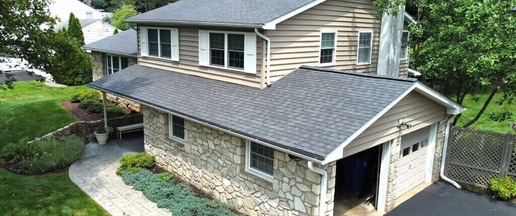 House with vinyl and stone siding