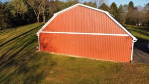Red siding on the exterior of a barn