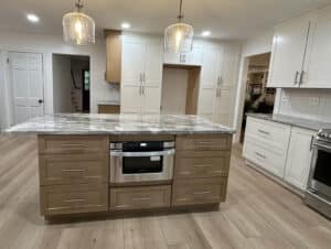 Completed kitchen remodel in York PA showing new counters, floors, and light fixtures