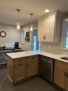 Kitchen remodel with new wooden cabinets and a backsplash from general contractors in Bucks County, PA