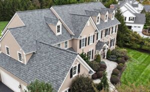 A house after their residential roof replacement in Chester Springs with gray shingles, taken at a side angle